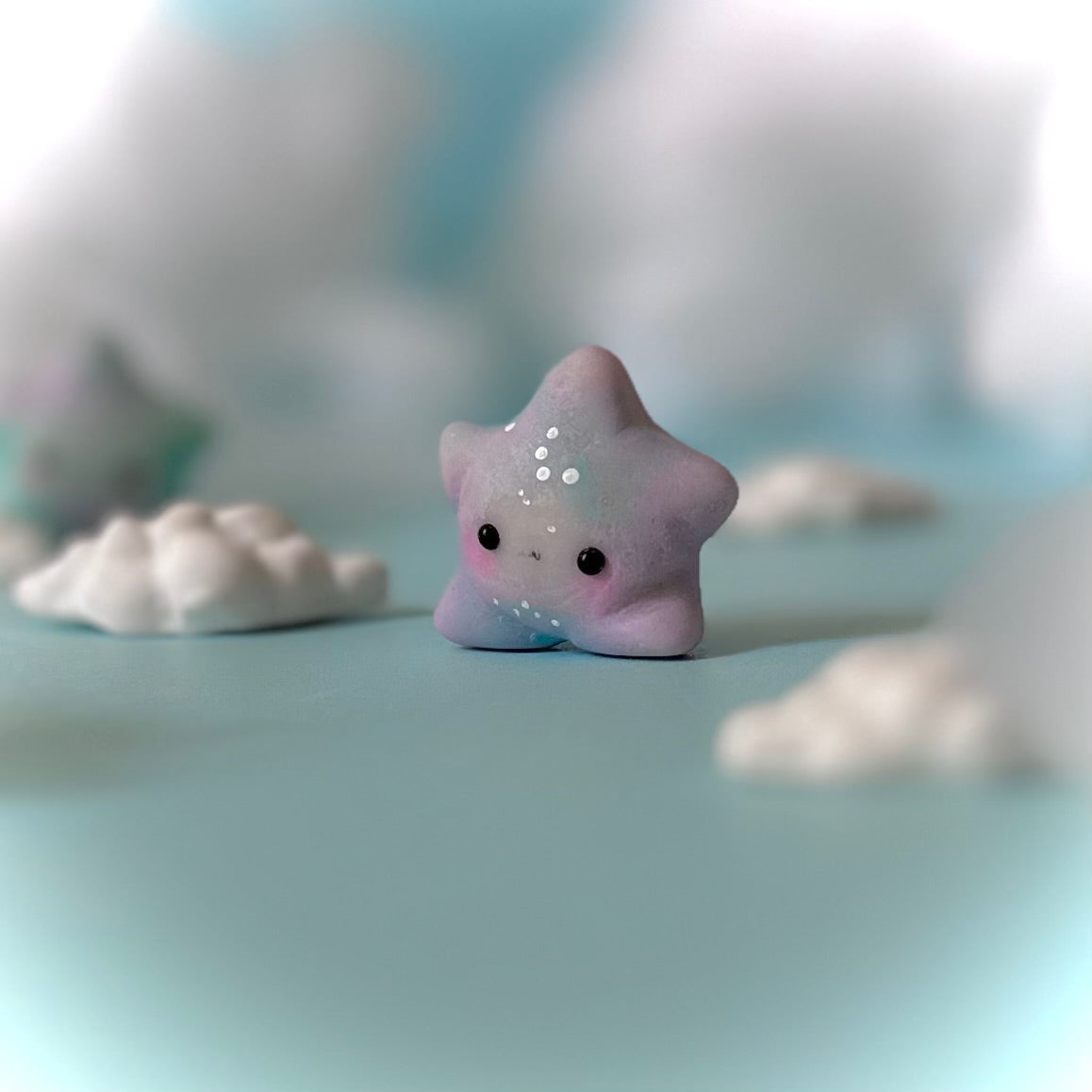 Multi colored Wishing Star with 2 Happy Little Clouds each desk buddy/figurine.