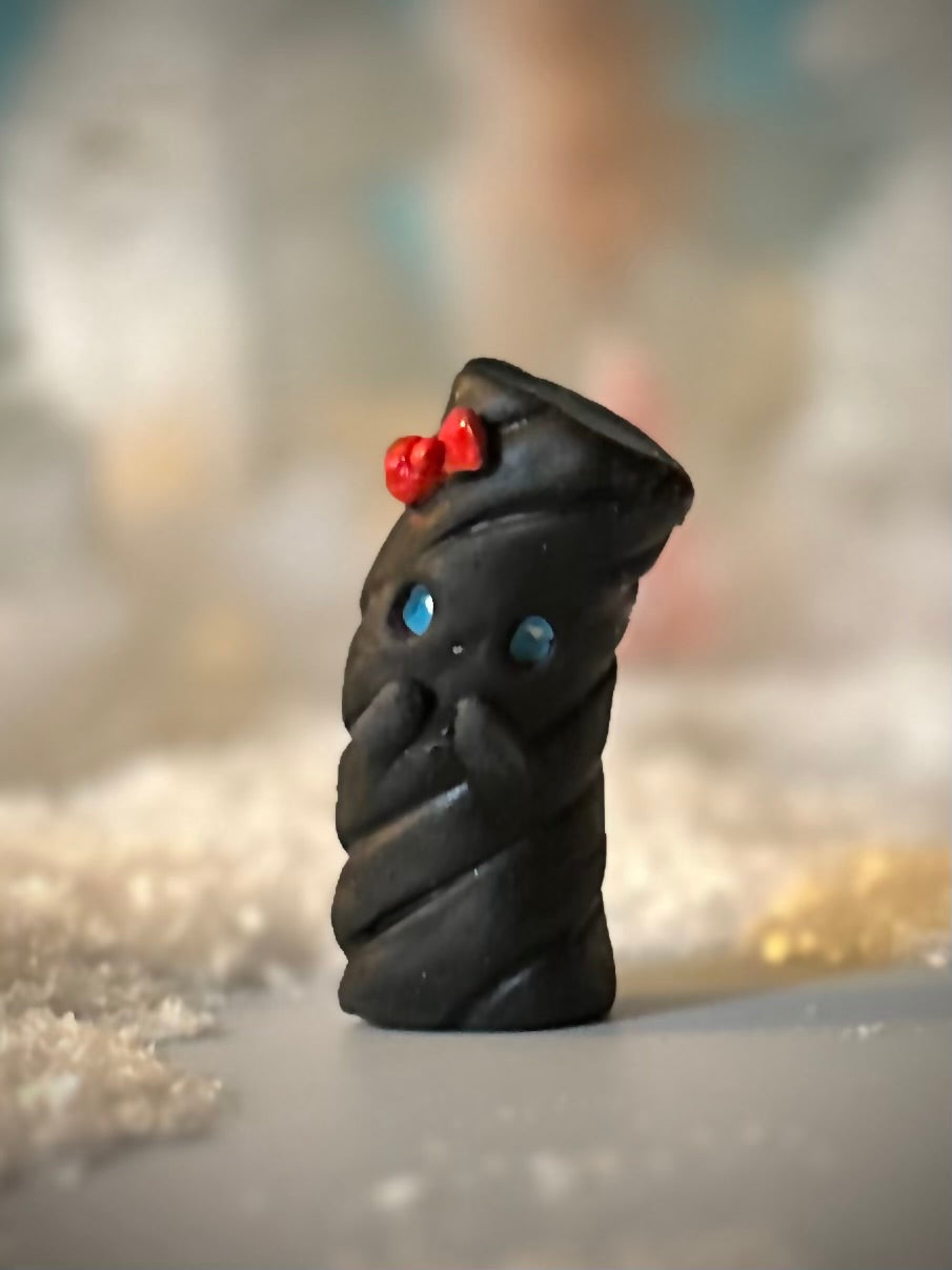 1.00 Surprise !!! Runaway Candies Licorice 2 inch figurine, art toy