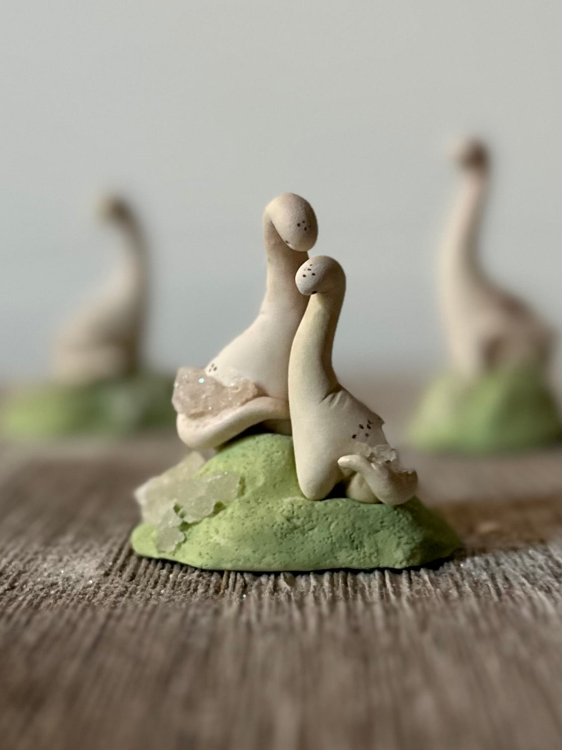 Pair of Crytal Keeper Dinos 2.5 inch figure in Glass Cloche