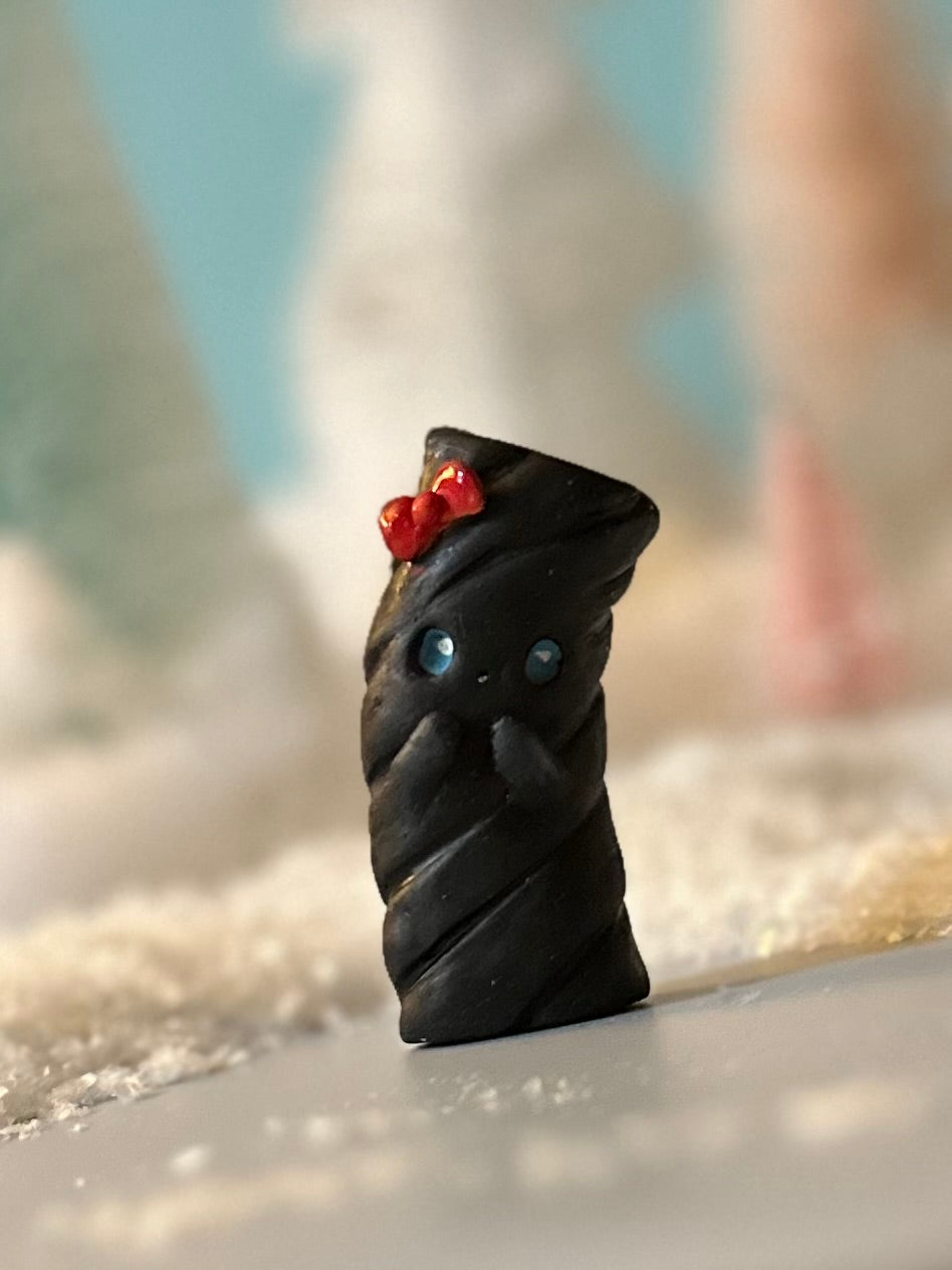 1.00 Surprise !!! Runaway Candies Licorice 2 inch figurine, art toy
