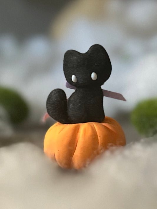 Charlie Black Cat with Pumkin base.  2.25 inch clay figurine. Pumpkin not flocked