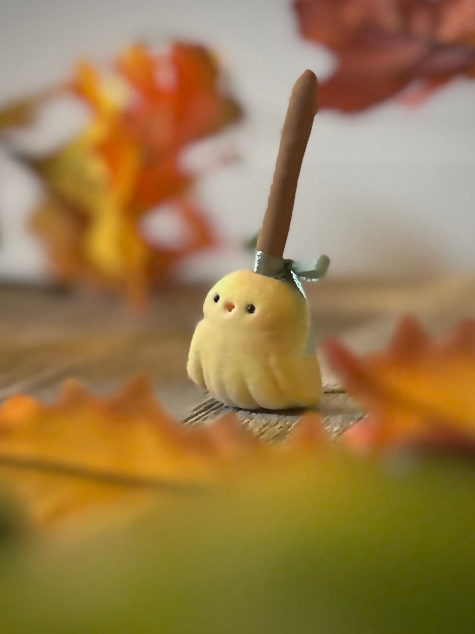Broomhilda 2  inch flocked, clay figurine with wooden base.