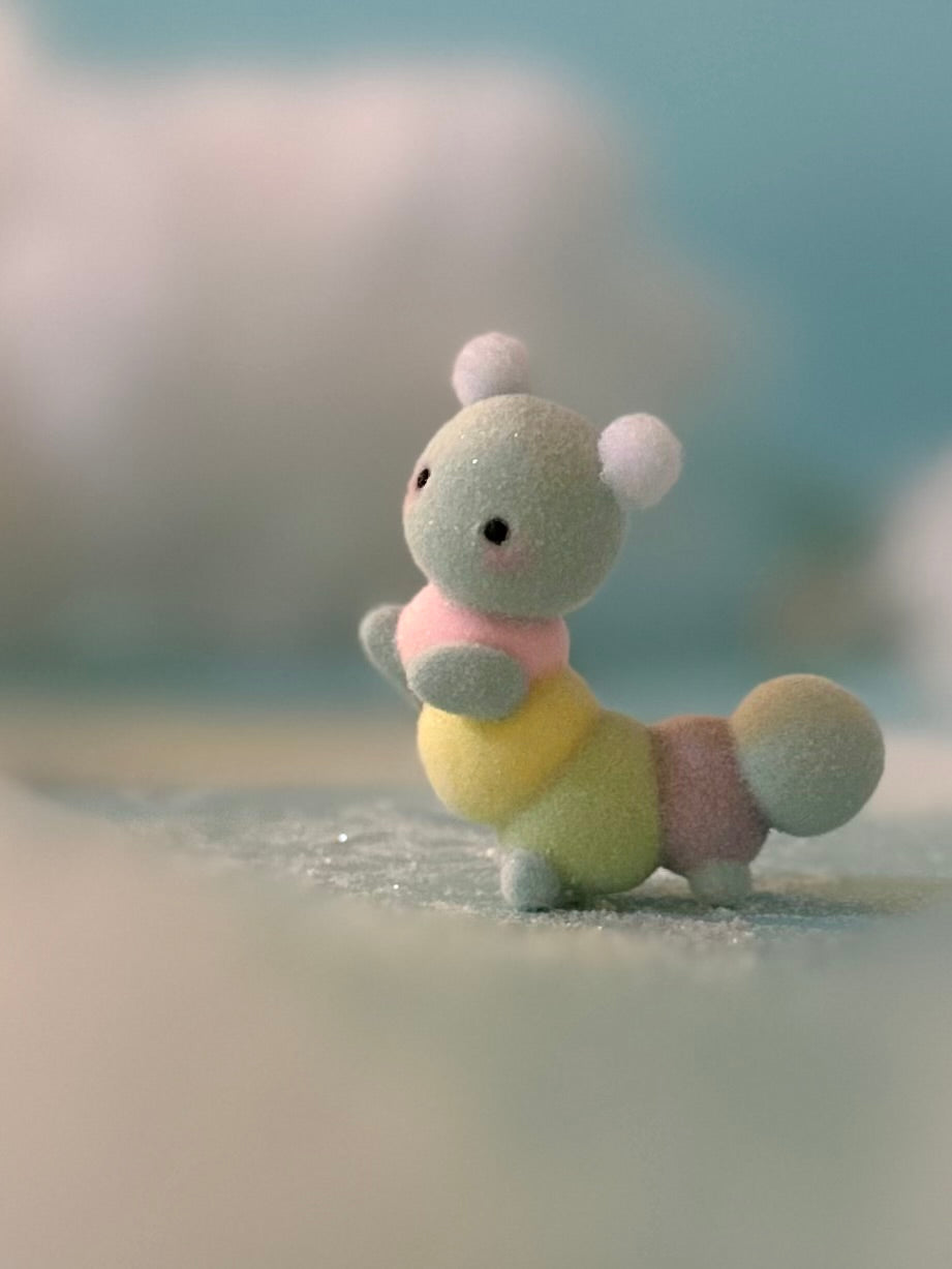 Preorder Rainbow Fuzzypillar 2 inch Flocked Figurine with Wooden Display Base