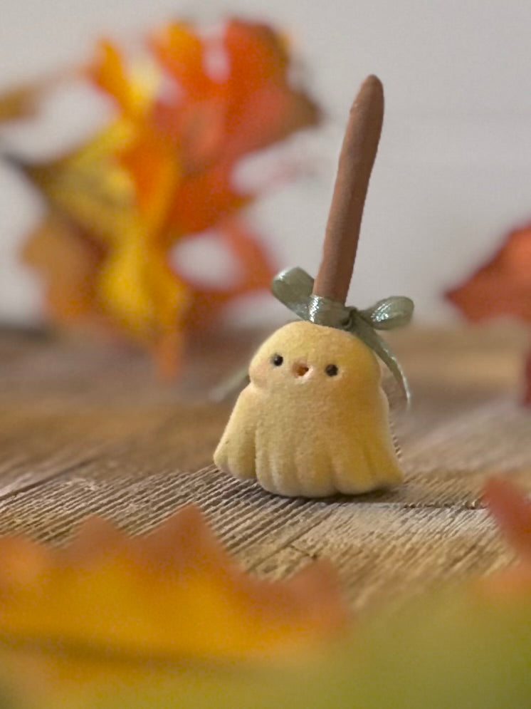 Broomhilda 2  inch flocked, clay figurine with wooden base.