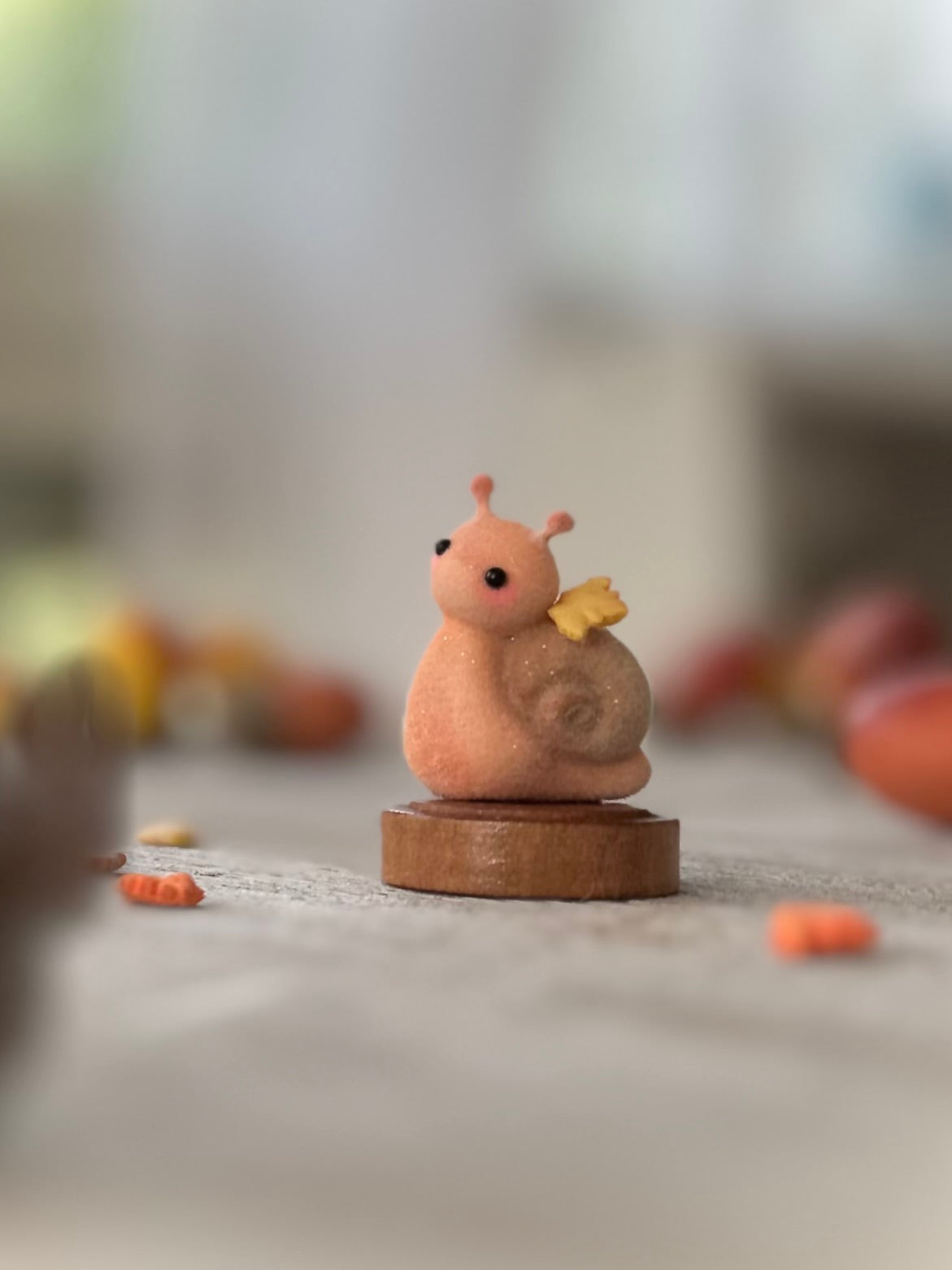 Fall snail 1.5 inch flocked, clay figurine with wooden base.