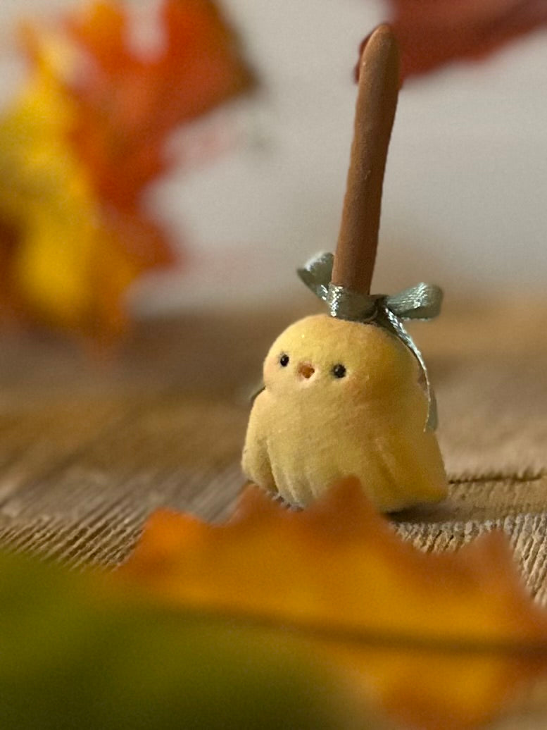 Broomhilda 2  inch flocked, clay figurine with wooden base.