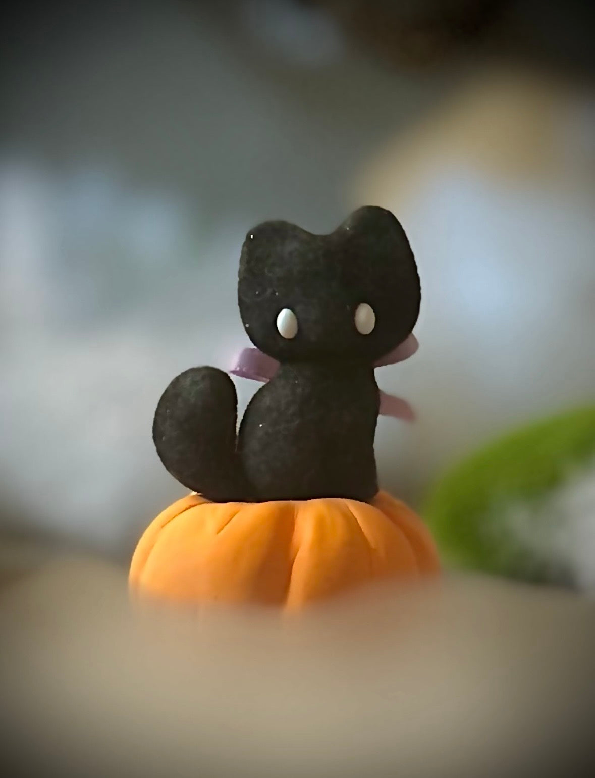 Charlie Black Cat with Pumkin base.  2.25 inch clay figurine. Pumpkin not flocked