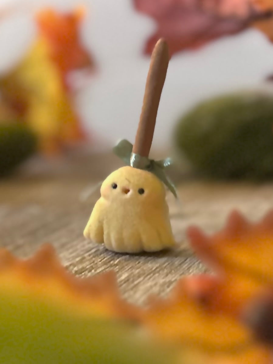 Broomhilda 2  inch flocked, clay figurine with wooden base.