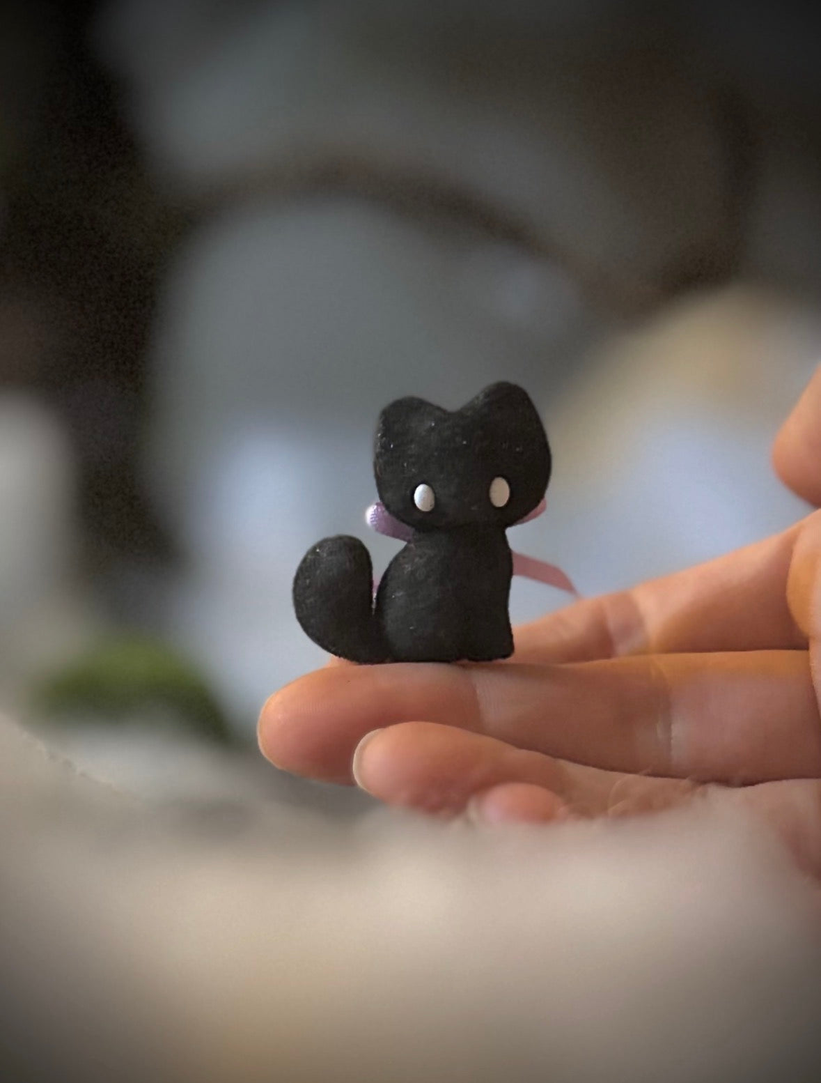 Charlie Black Cat 1.5 inch flocked, clay figurine with wooden base.