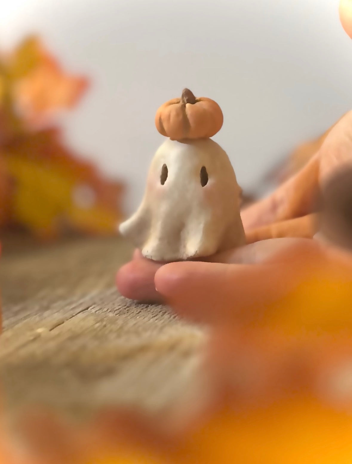 Punkin head Boo 2 inch clay figurine with wooden base.