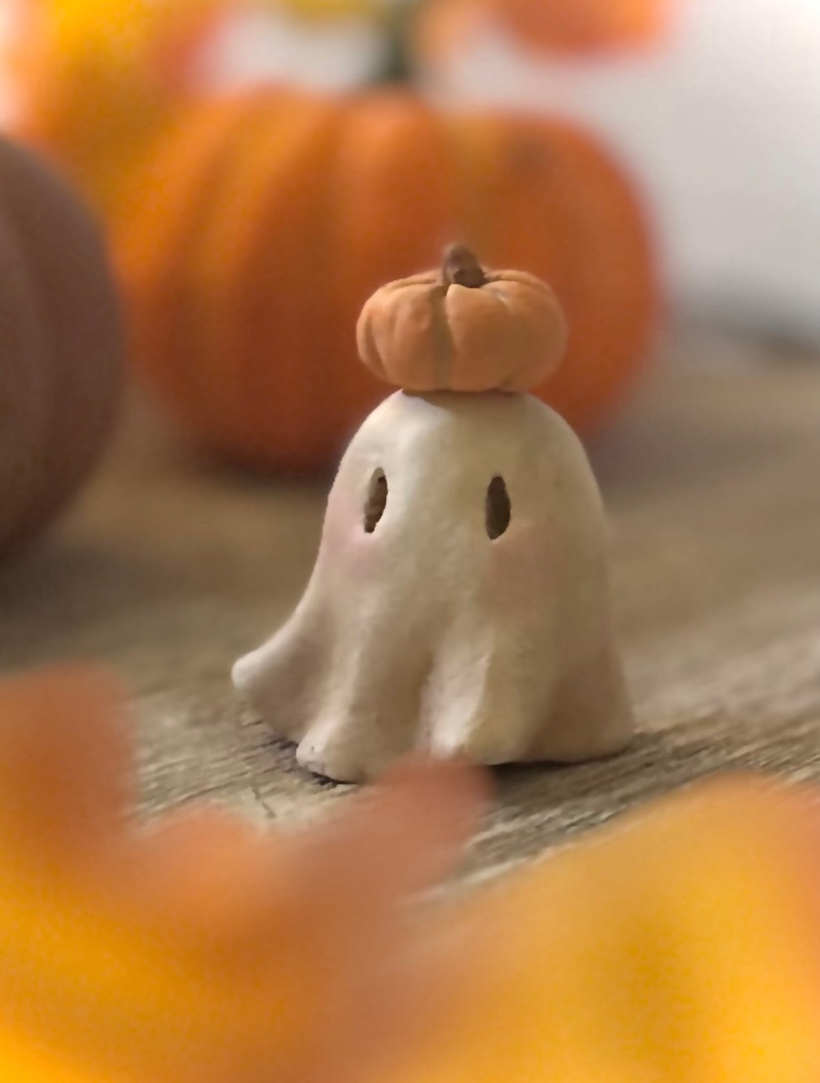 Punkin head Boo 2 inch clay figurine with wooden base.